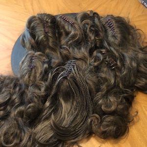 Seven banana clip synthetic ponytail hair extensions.